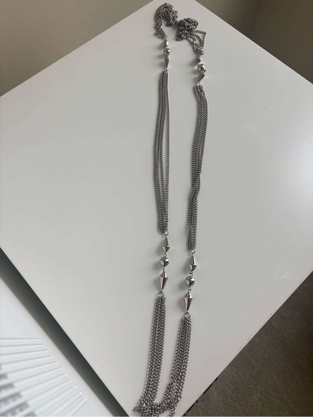 Vintage LONG 4 strand silver-tone necklace with geometric accents.